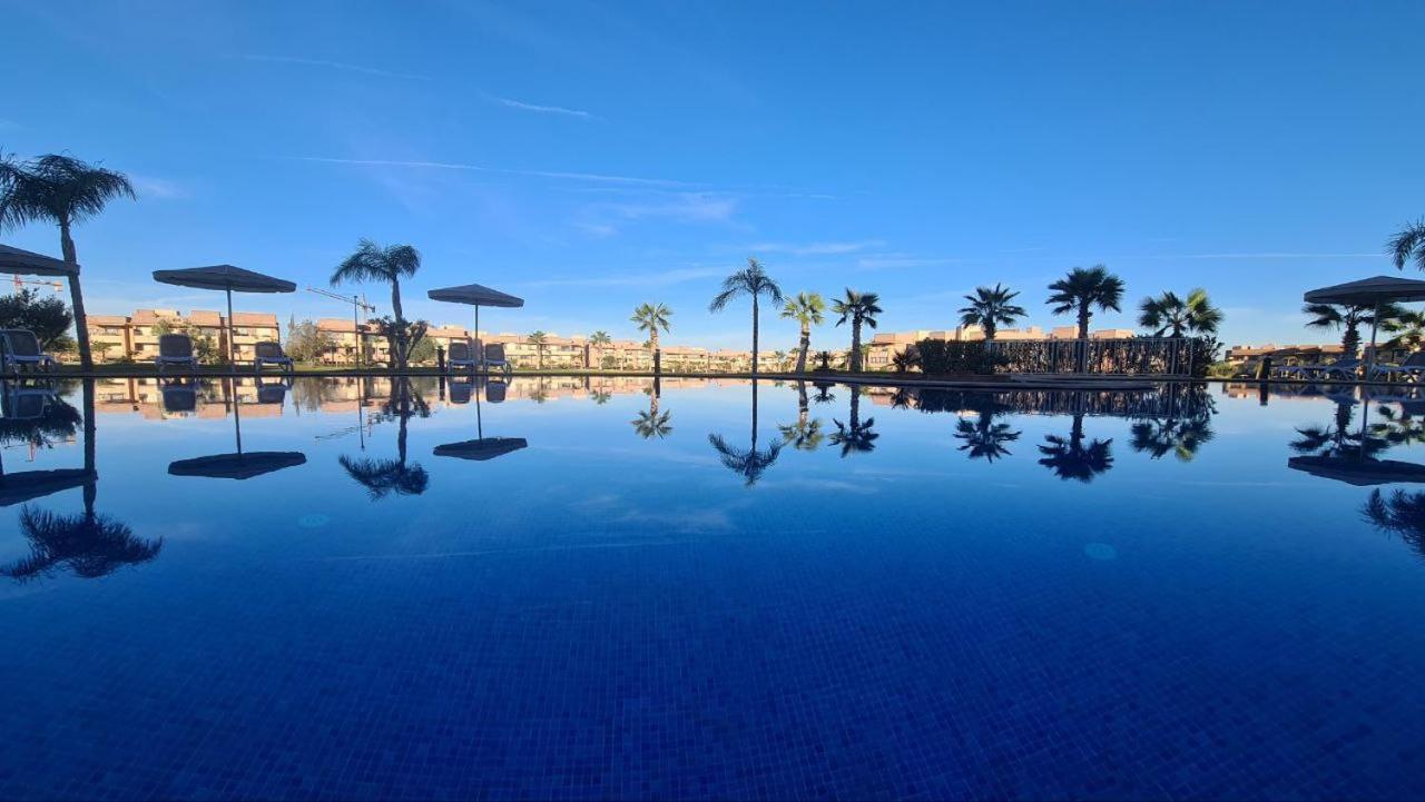 מרקש Mini-Villa Situee Dans Une Residence Prestigia A Marrakech, Avec Une Vue Sur La Piscine Et Le Golf Une Securite 24H Sur 24 Et Une Proximite Ideale De L Aeroport 5 Minutes C Est Une Offre Parfaite Pour Des Vacances מראה חיצוני תמונה